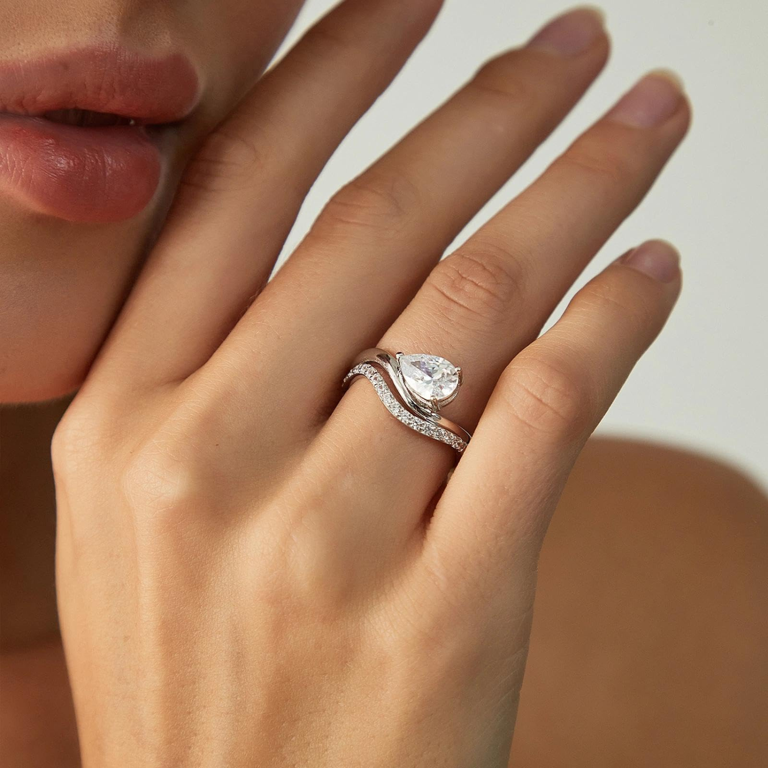 fake bridal set rings, curved engagement rings, curved band, pear engagement rings, pear cut, cubic zirconia rings, cubic zirconia usa, travel rings, fake diamond rings, cz rings, affordable jewelry, gold engagement rings