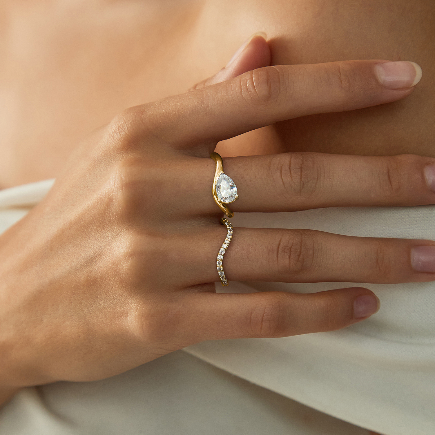 fake bridal set rings, curved engagement rings, curved band, pear engagement rings, pear cut, cubic zirconia rings, cubic zirconia usa, travel rings, fake diamond rings, cz rings, affordable jewelry, gold engagement rings