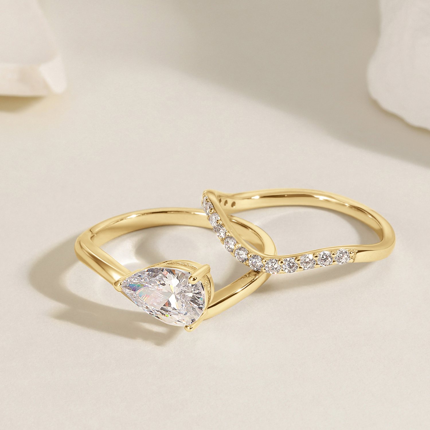 fake bridal set rings, curved engagement rings, curved band, pear engagement rings, pear cut, cubic zirconia rings, cubic zirconia usa, travel rings, fake diamond rings, cz rings, affordable jewelry, gold engagement rings