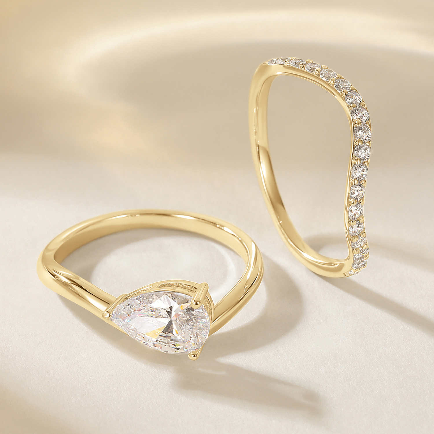 fake bridal set rings, curved engagement rings, curved band, pear engagement rings, pear cut, cubic zirconia rings, cubic zirconia usa, travel rings, fake diamond rings, cz rings, affordable jewelry, gold engagement rings