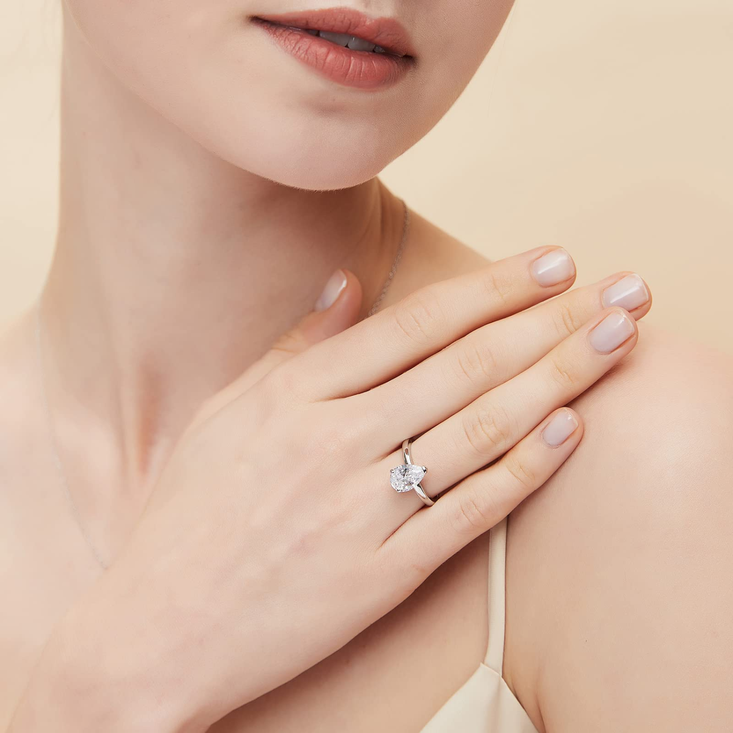 fake diamond ring, cubic zirconia rings, sterling silver rings, promise rings, pear shaped rings, teardrop ring, teardrop engagement ring, teardrop emerald ring, teardrop wedding ring
