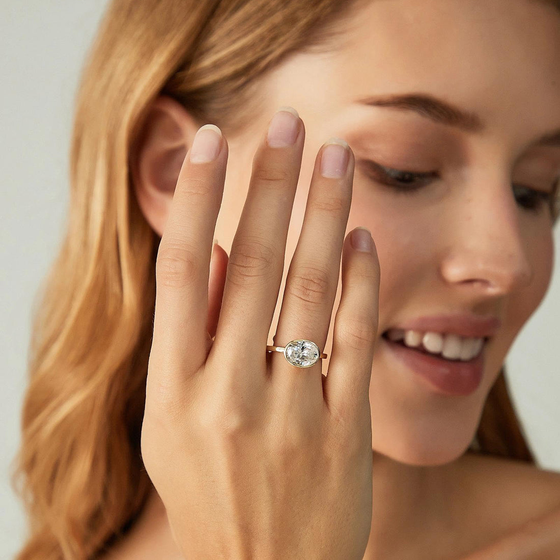 3CT Oval Cut East West Bezel Solitaire Engagement Ring